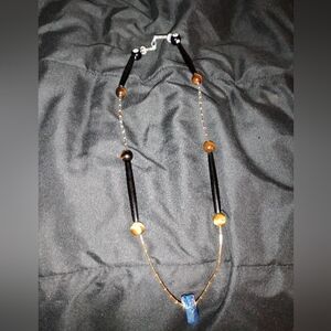 Kingdom shirt tie. Blue ,silver tiger eye, 8 ball,gold glass.